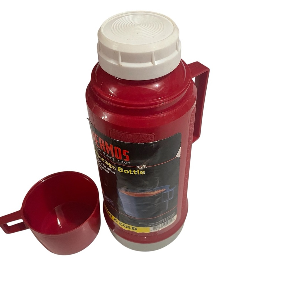 vintage‎ red Thermos vacuum beverage bottle.